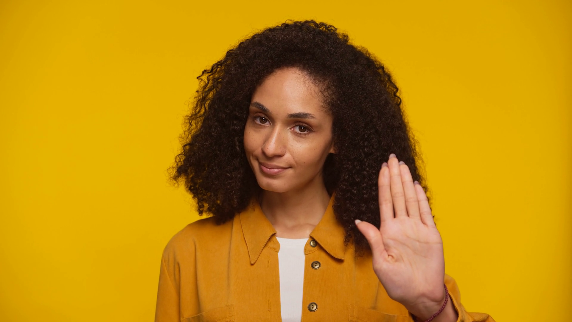 Woman Raising Hand In Stop Gesture On Yellow Stock Footage SBV ...
