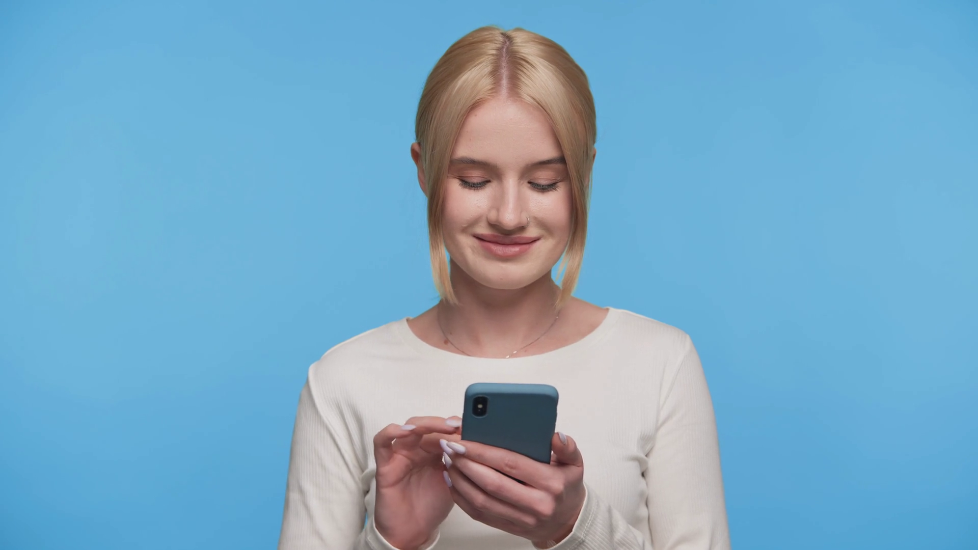 Smiling Woman Scrolling On Smartphone Stock Footage SBV-352380935 ...