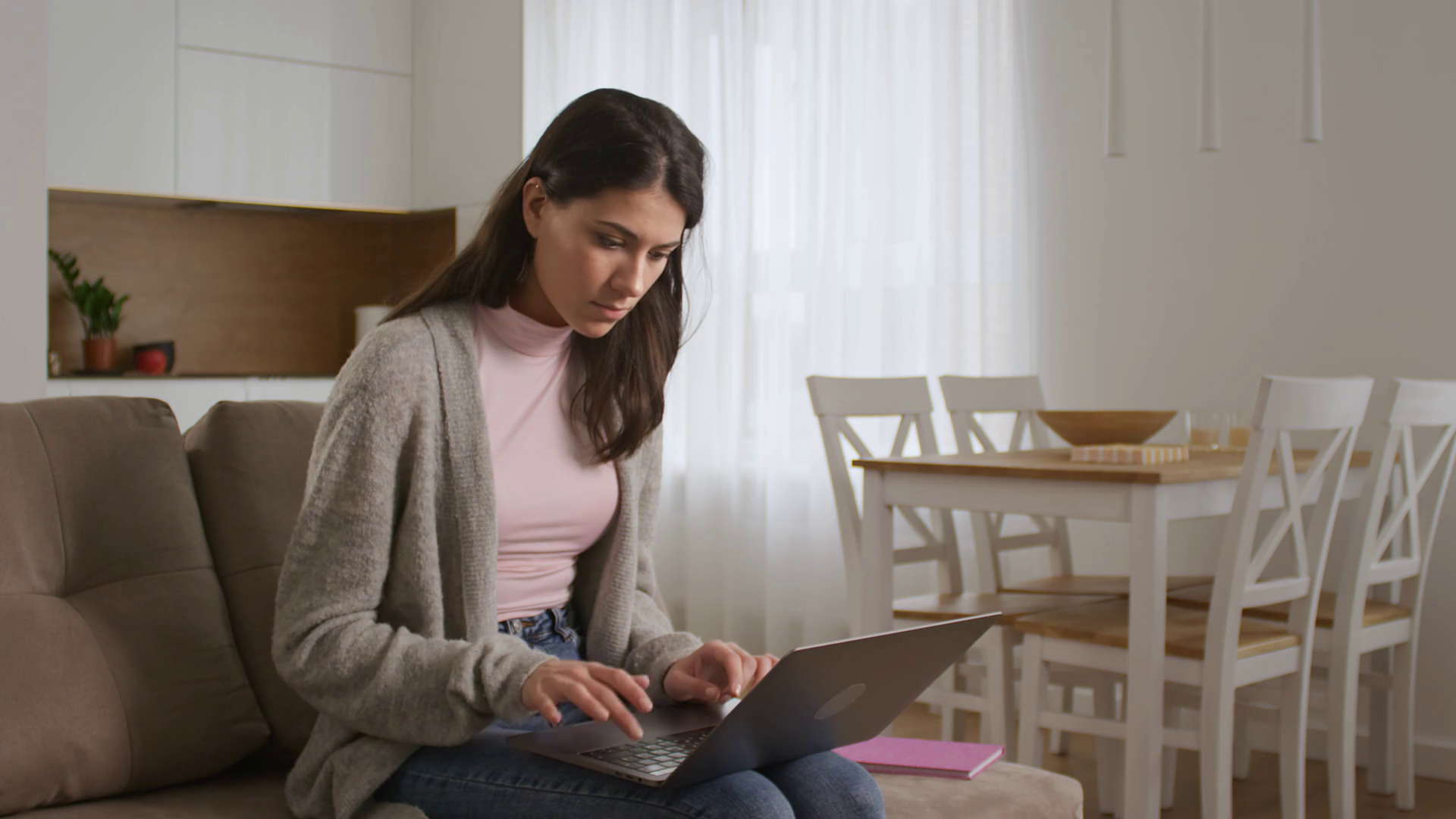 Young Woman Student Is Typing An Essay Indoors In Living Room Stock 