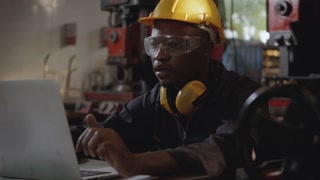 Group of Industrial Workers Having Remote Video Conference on Project