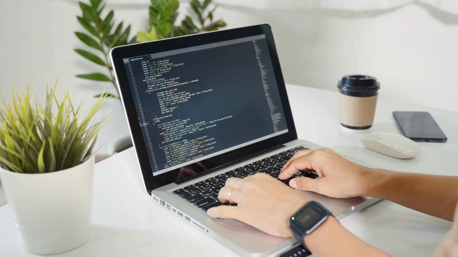 Programmer woman writing program HTML code sitting at workplace in ...