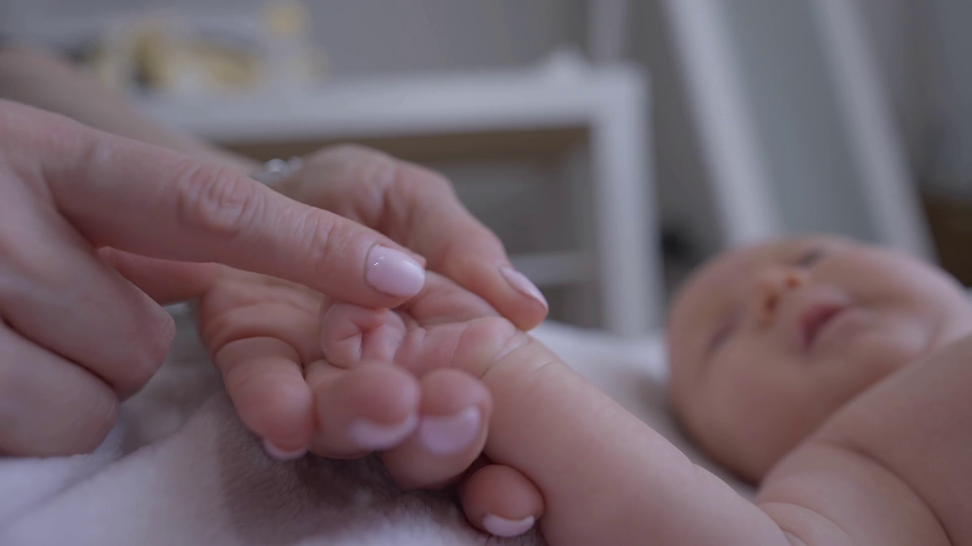 Closeup Female Finger Stroking Newborn Baby Stock Footage SBV