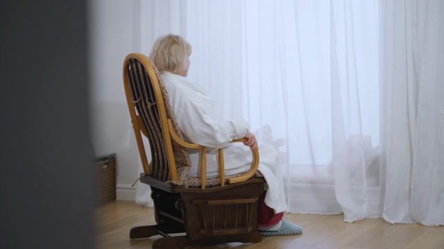 Person Sitting On Rocking Chair Stock Footage: Royalty-Free Video Clips ...