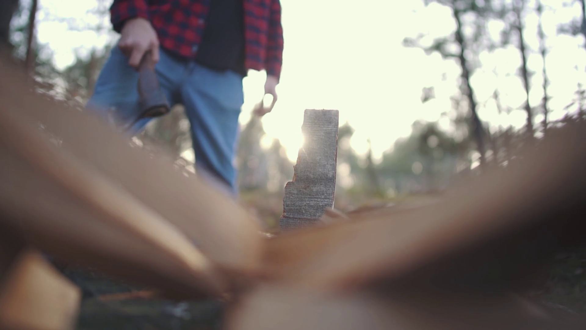 A Guy Chops Wood With Axe In Forest Slow Stock Footage SBV329915885