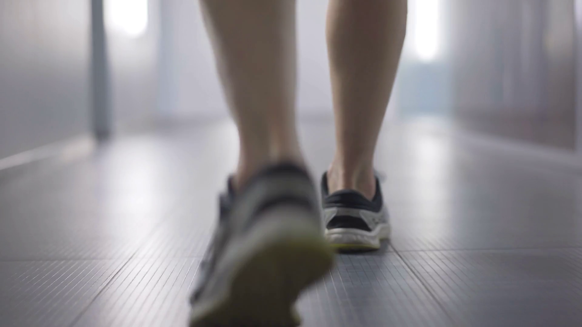 Athlete's Feet In Gym Confident Man Walking Stock Footage SBV