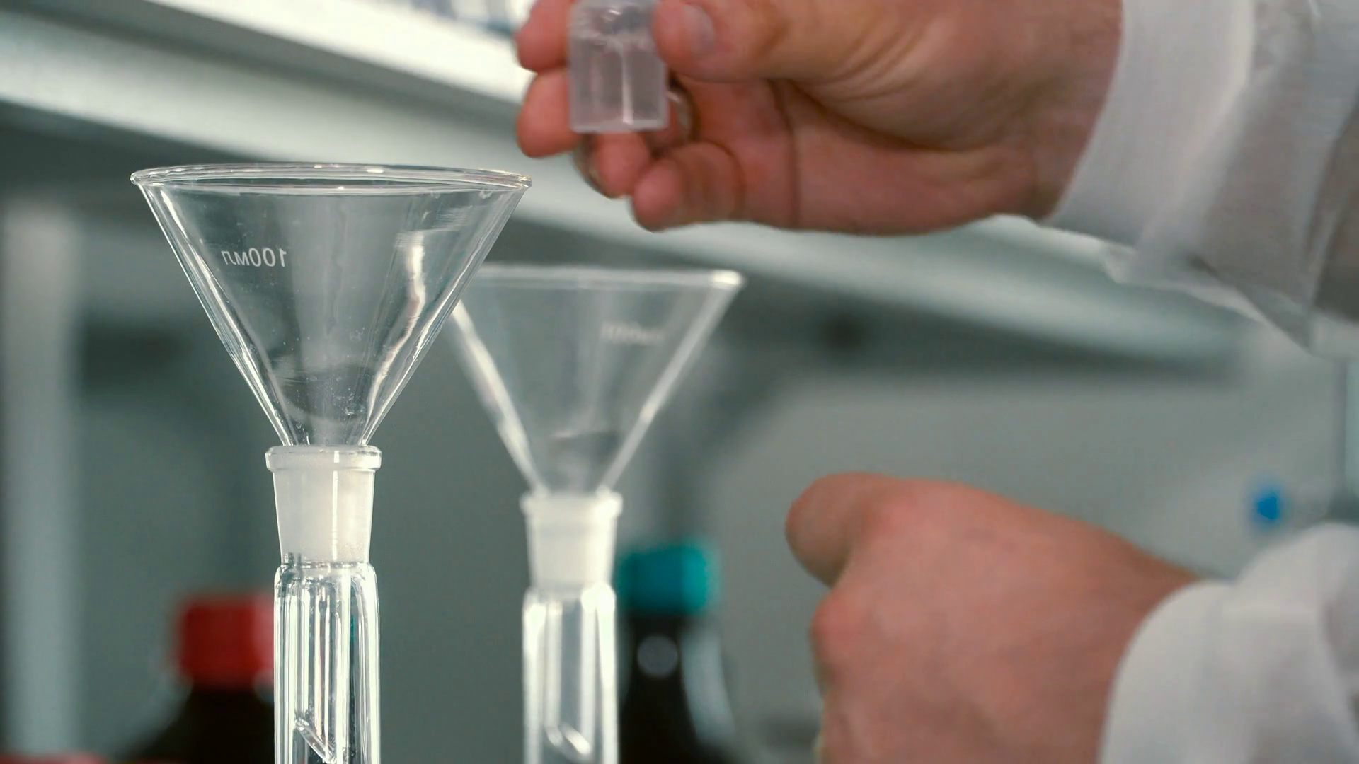 Chemist Pouring Liquids Into Flask Through Stock Footage SBV324449955 Storyblocks
