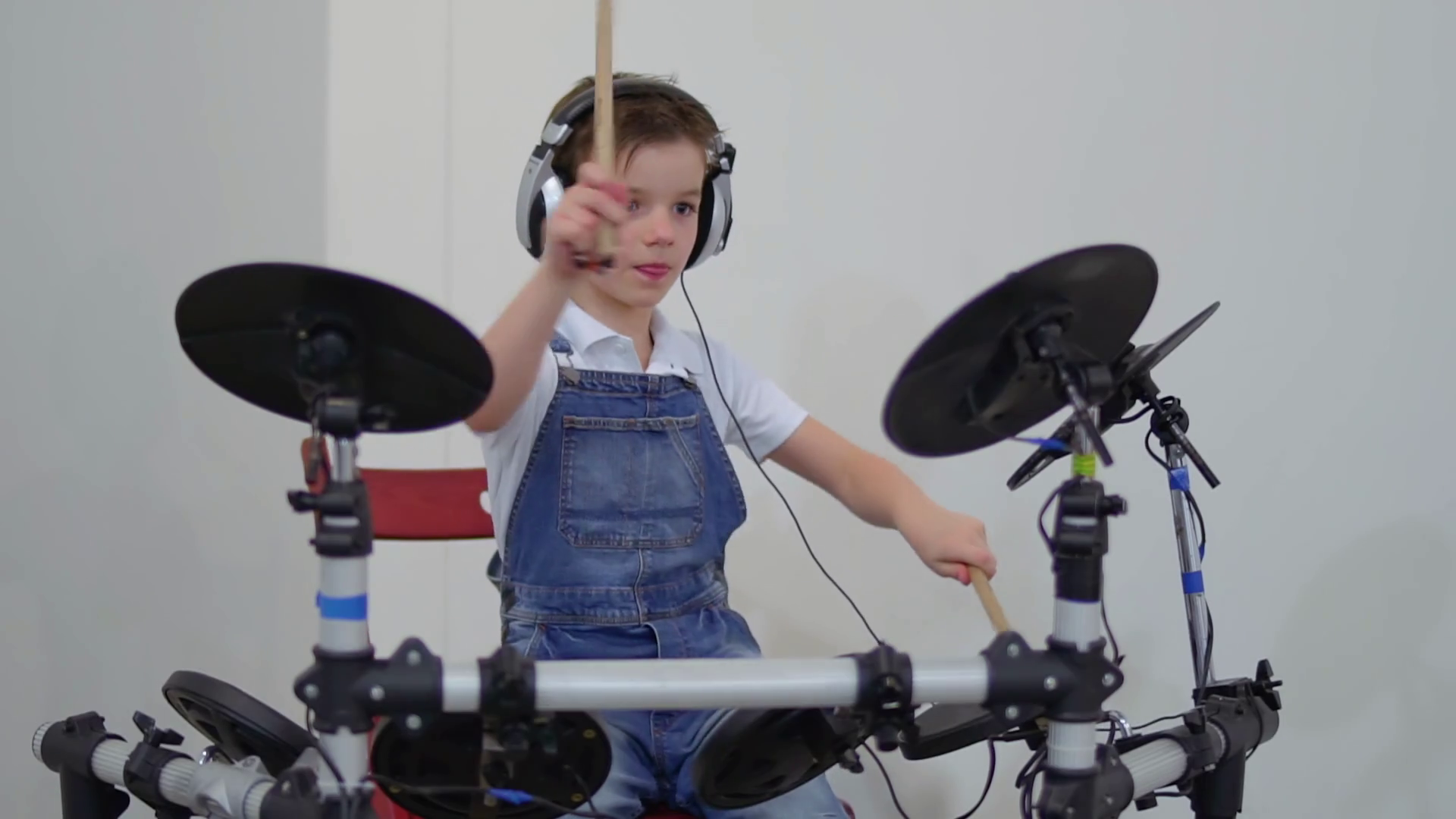 Cute little boy playing drums Stock Video Footage 0013 SBV323057942