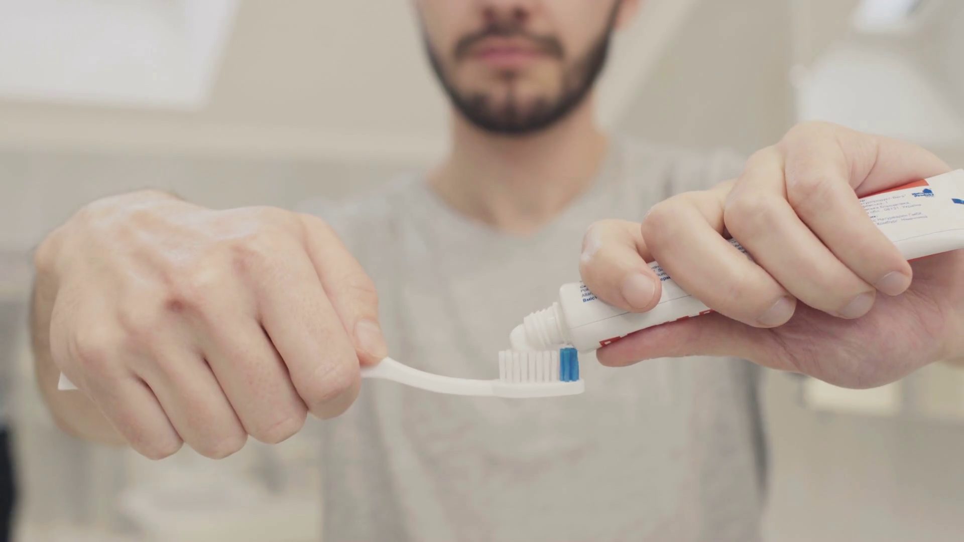 Man Squeeze Toothpaste On Toothbrush Stock Footage SBV319578081
