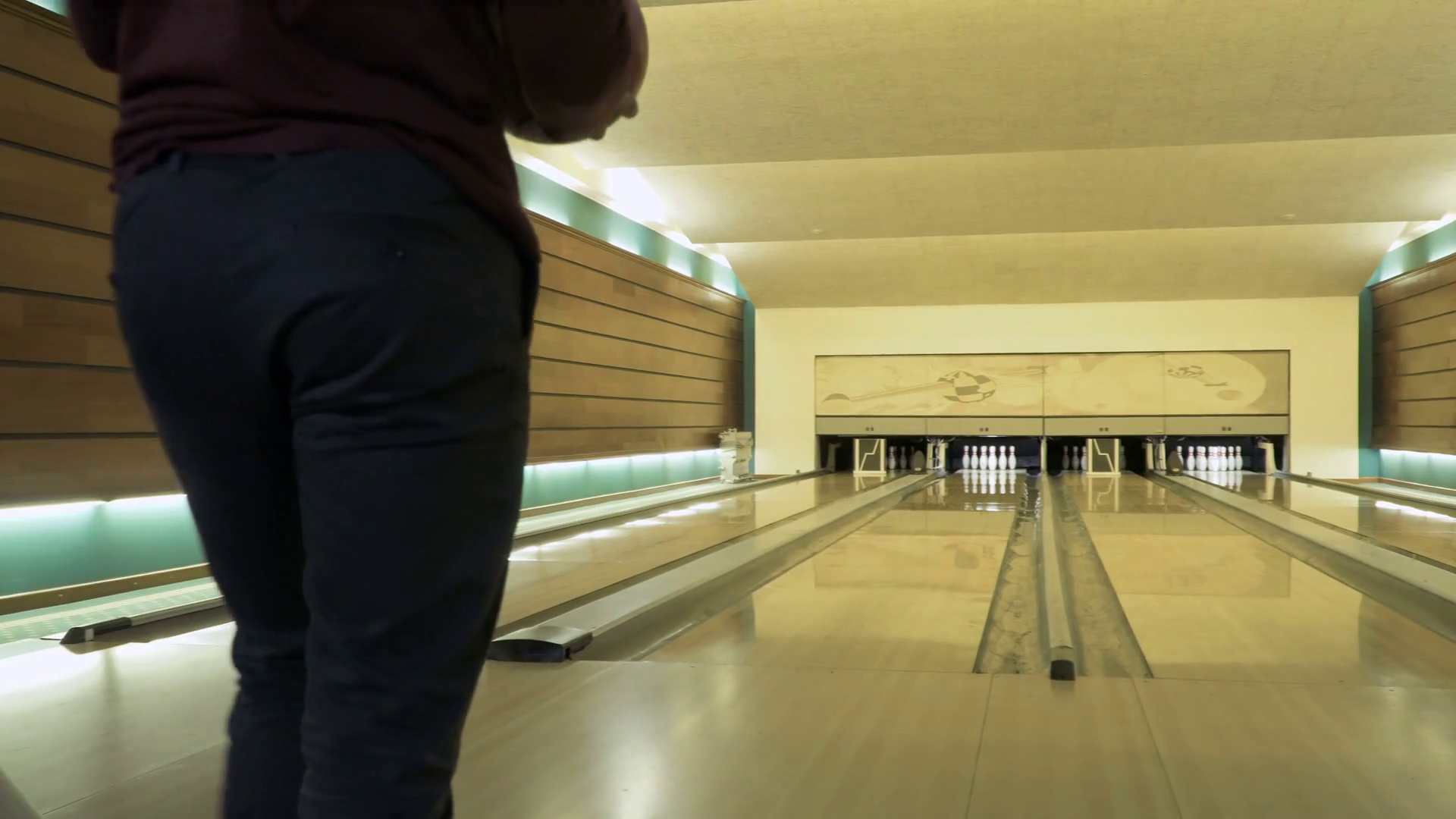 Man throws bowling ball, camera follows after the ball Stock Video