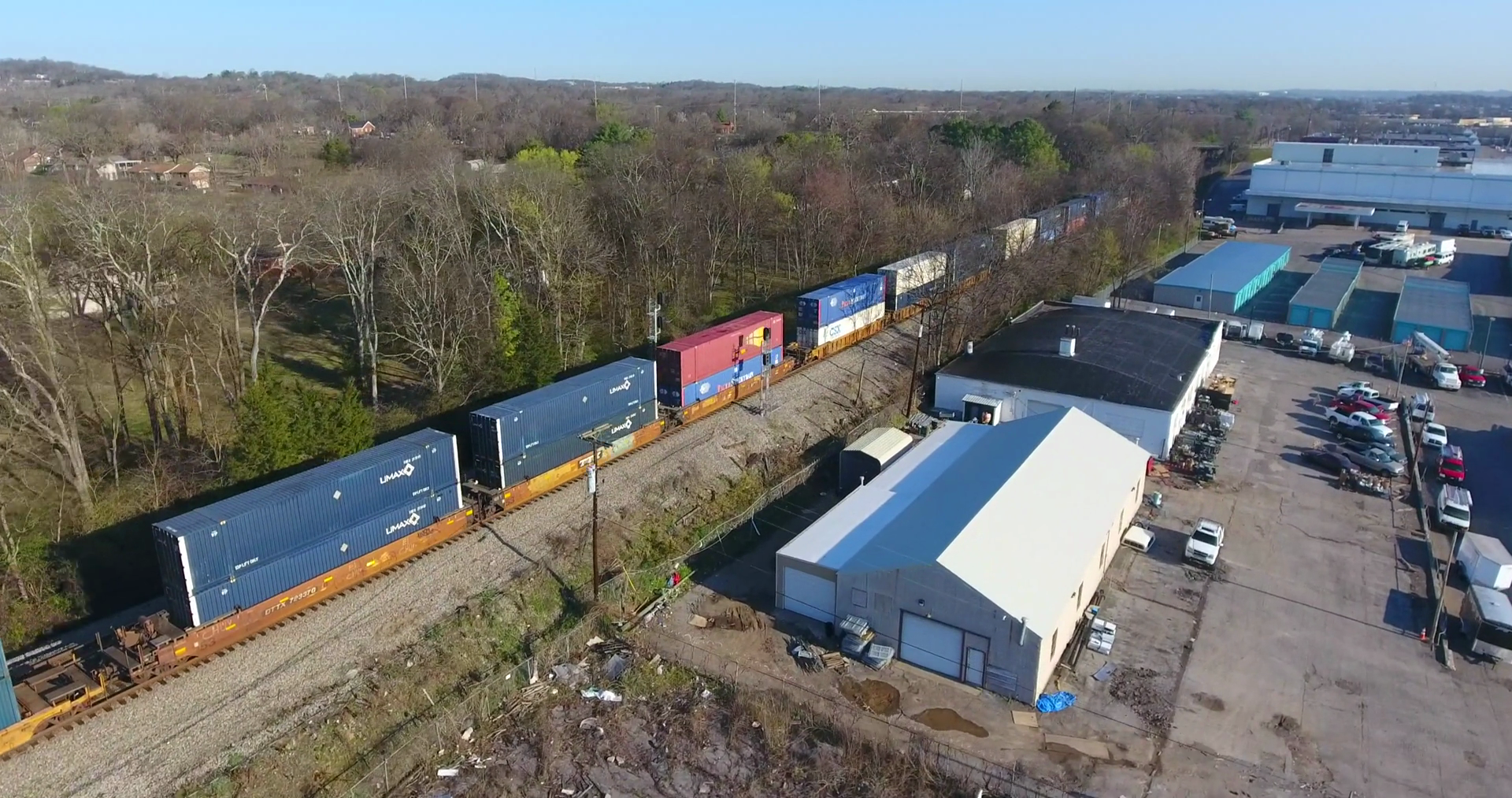 4k Aerial Freight Train Box Cars Flyover Stock Footage SBV313282838