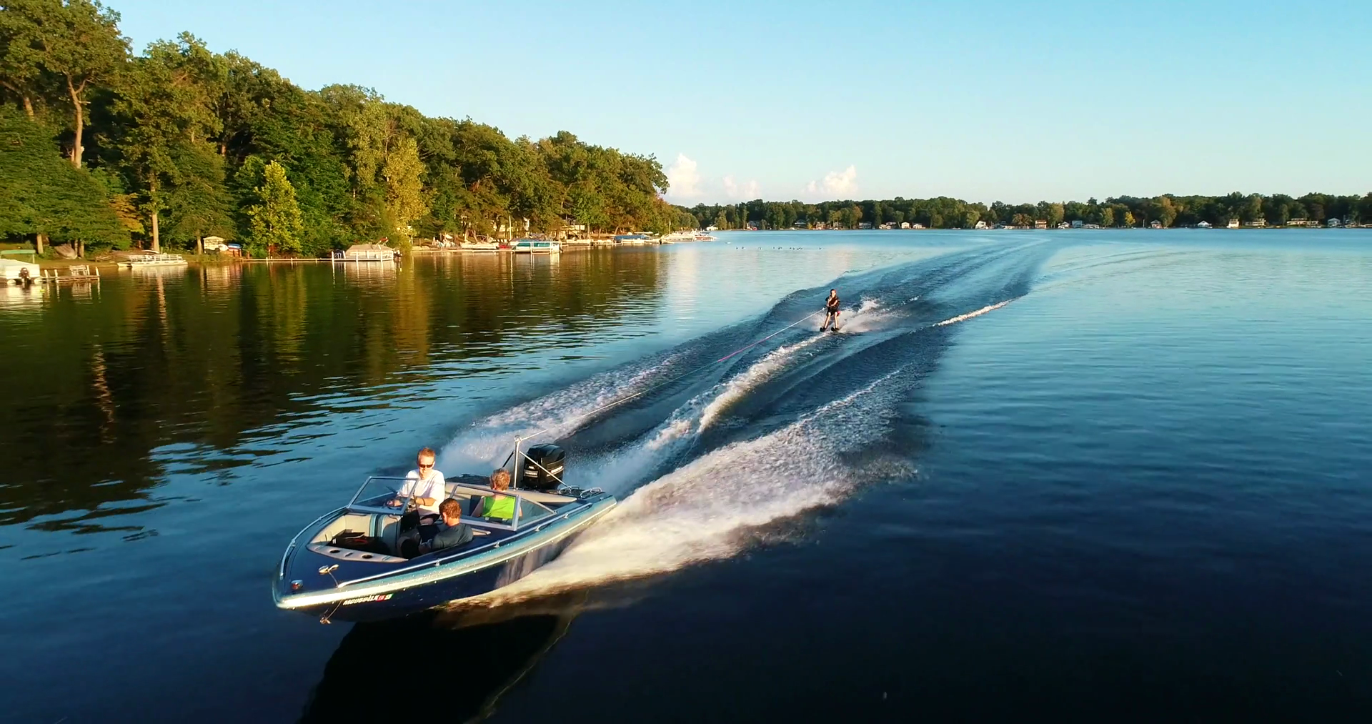 Water Sports Lake Boating Waterskiing Aerial Drone Sunset Lake Stock