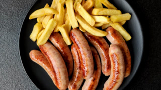 Grilled or barbecued chicken sausages for the dinner table. Grilled sausages