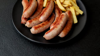 Grilled or barbecued chicken sausages for the dinner table. Grilled sausages