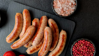 Grilled or barbecued chicken sausages for the dinner table. Grilled sausages