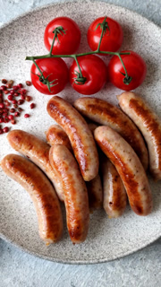 Grilled or barbecued chicken sausages for the dinner table. Grilled sausages