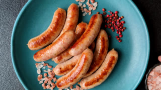 Grilled or barbecued chicken sausages for the dinner table. Grilled sausages