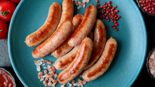 Grilled or barbecued chicken sausages for the dinner table. Grilled sausages