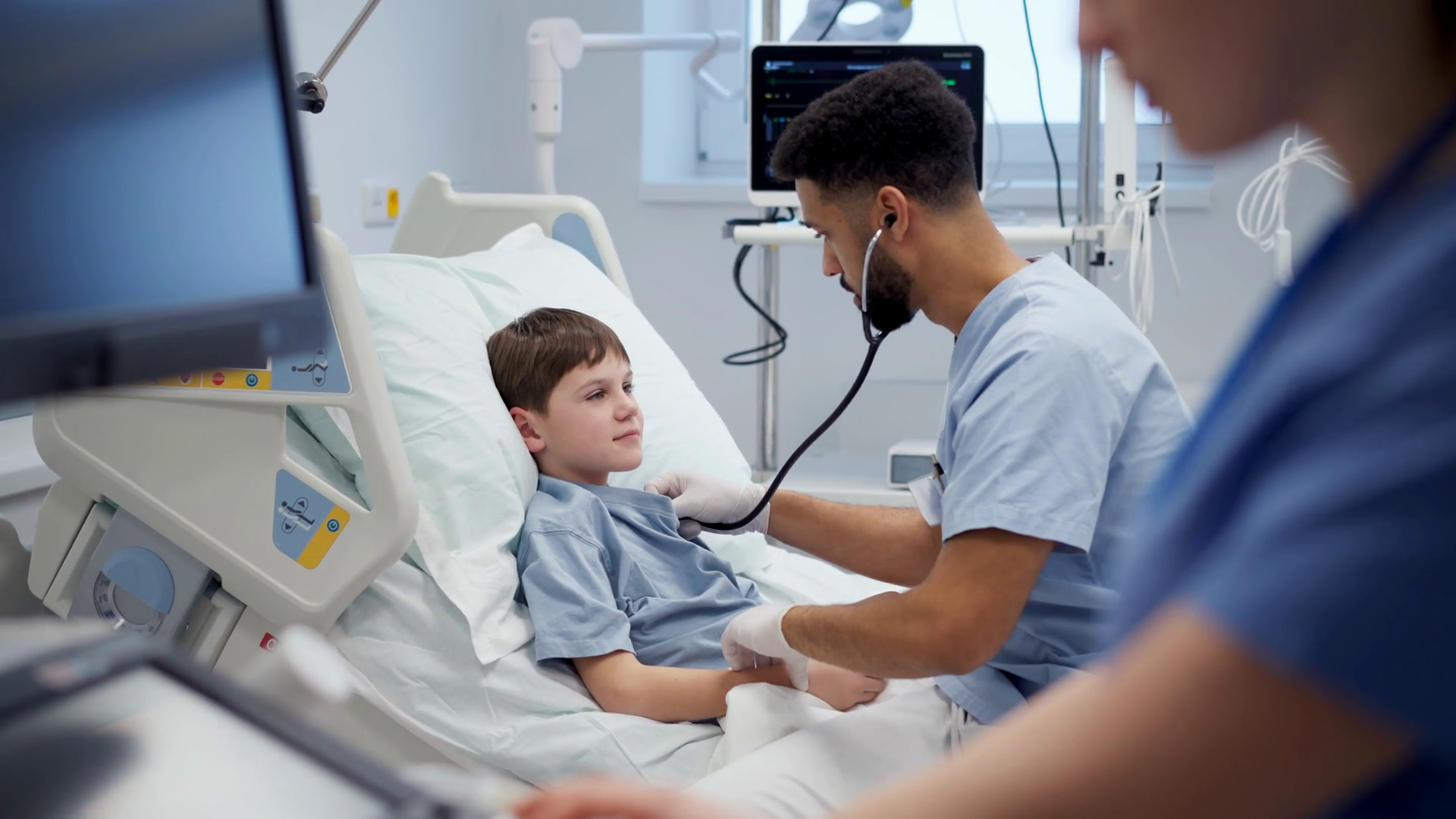 Nurse Doctor Caring Young Boy Patient Lying Stock Footage SBV-352233046 ...
