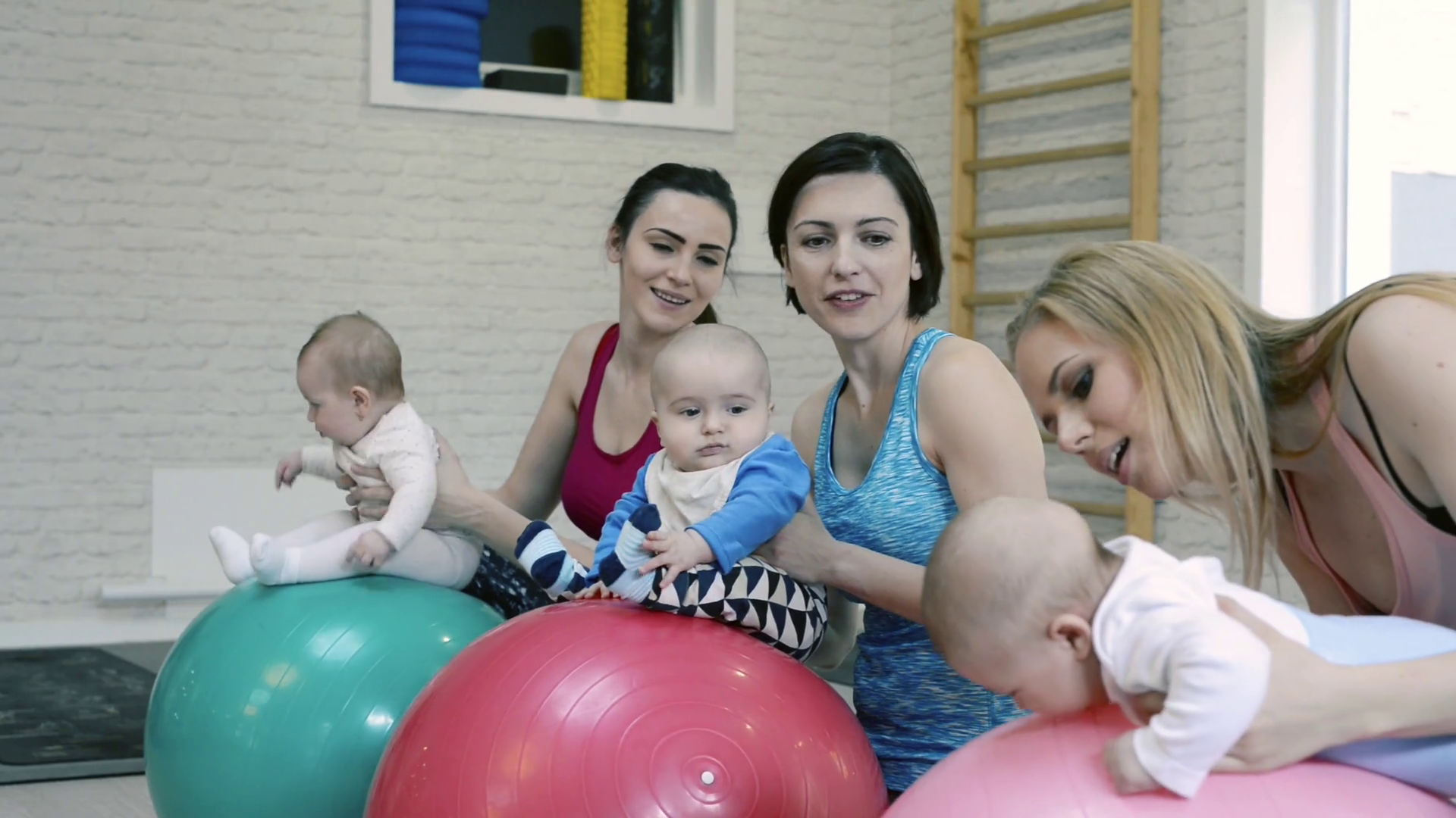 Mothers Exercising With Babies In Gym On Stock Footage SBV317118284