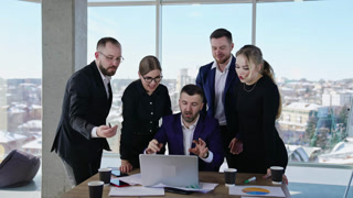 Team dicussing business ideas. Business conference in modern office room.