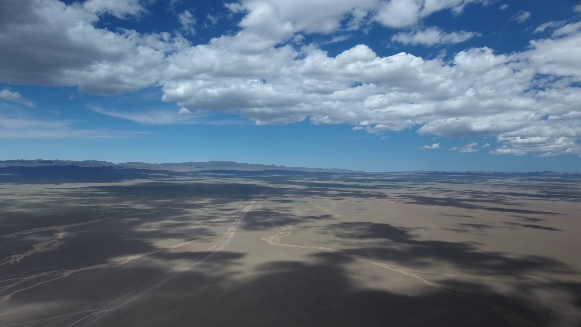Aerial Drone Timelapse In Desert With Clouds Stock Footage SBV