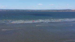 Kite surfers on the Etang de Thau windy day aerial Sete France