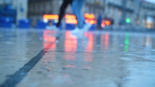 Montpellier place de la comedie rainy day raindrops on pavement France slow motion