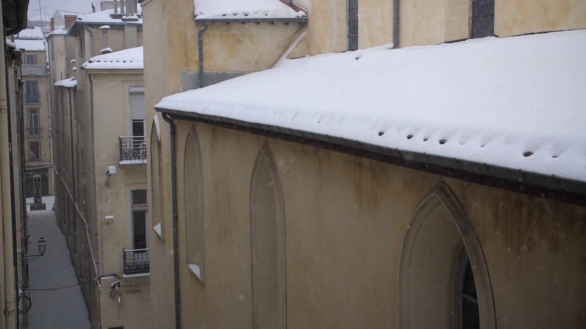 View from a building of church roof covered with snow in Montpellier