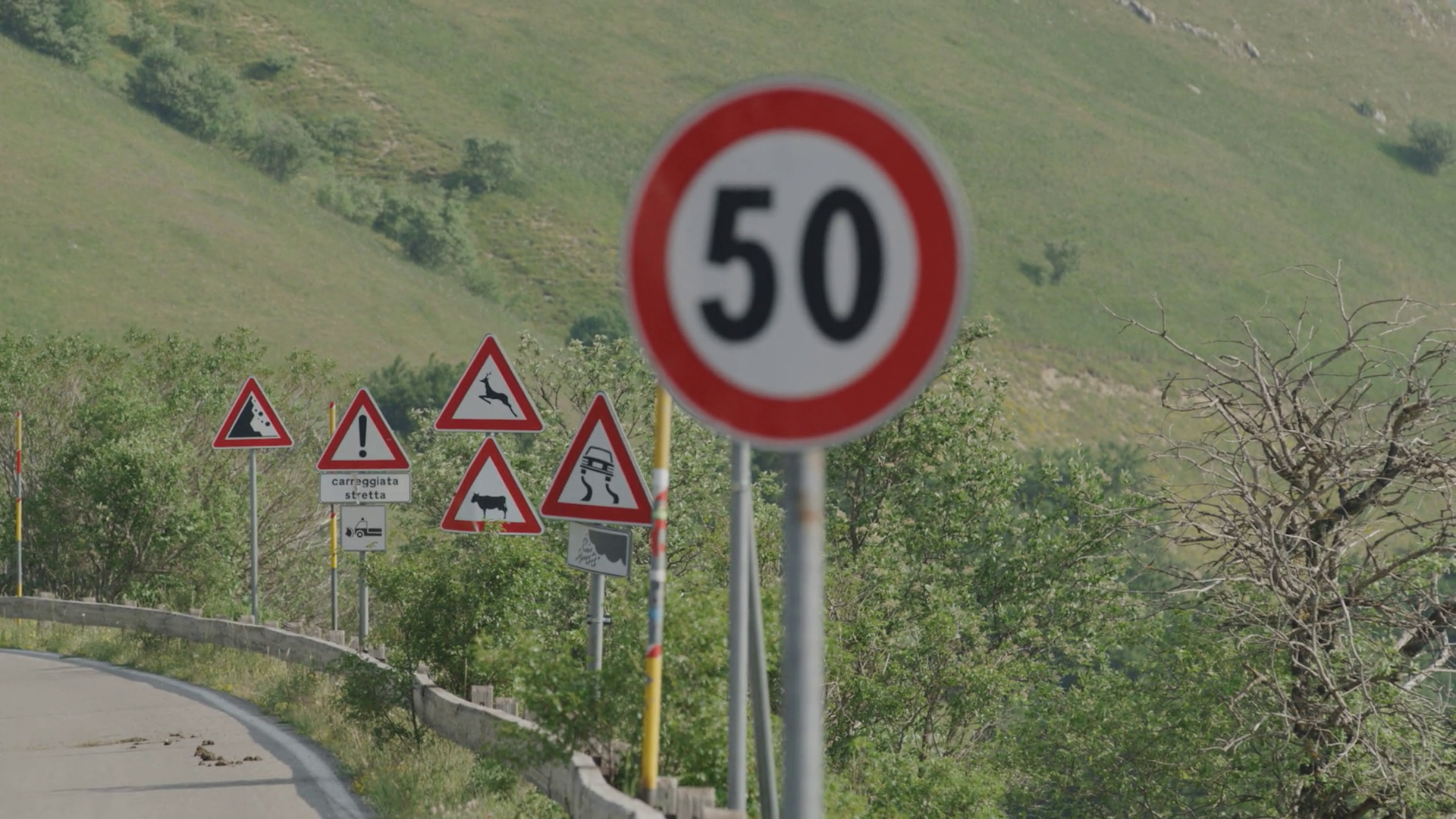 Speed Limit Sign On Rural Road With Warning Stock Footage SBV-352570484 ...