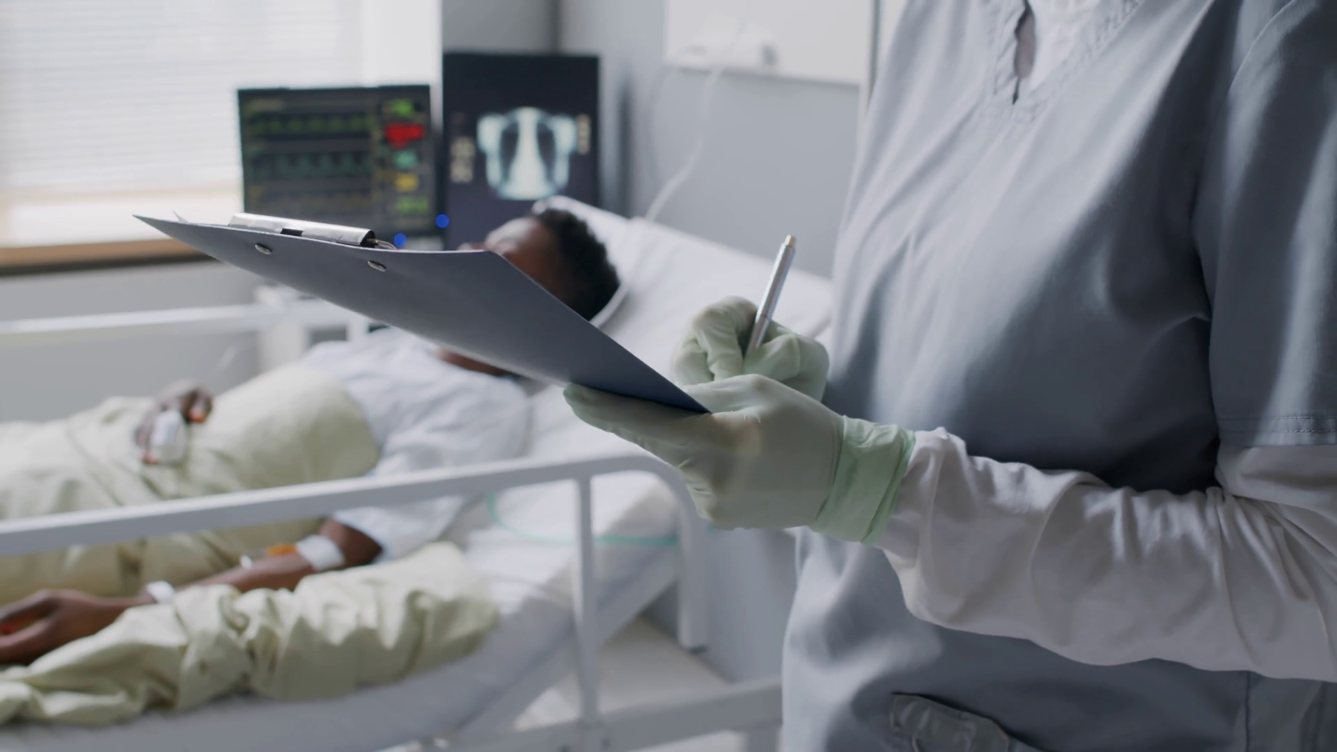 Nurse Taking Notes On Clipboard Checking On Stock Footage SBV-352712314 ...