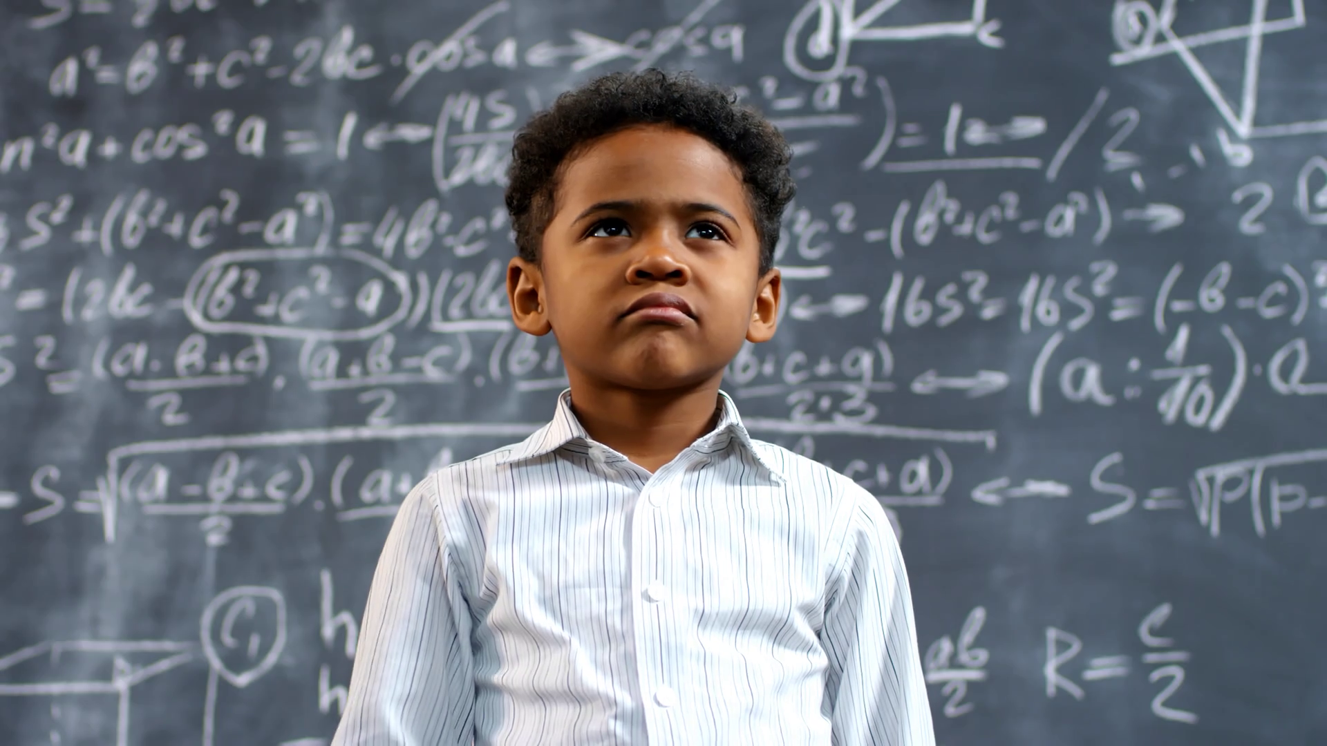 Portrait Of Intelligent Young Boy Solving Stock Footage SBV-334523078 ...