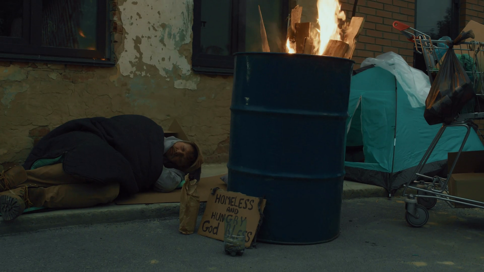 Long Shot Of Tramp Sleeping On Cardboard Stock Footage SBV-348376390 ...