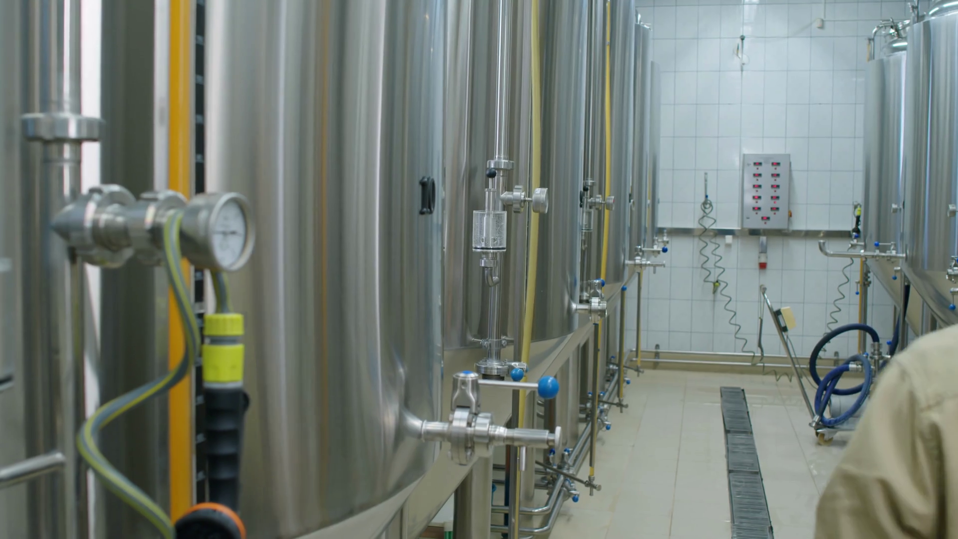 Medium Shot Of Rows Of Beer Fermenting Tanks Stock Footage SBV ...