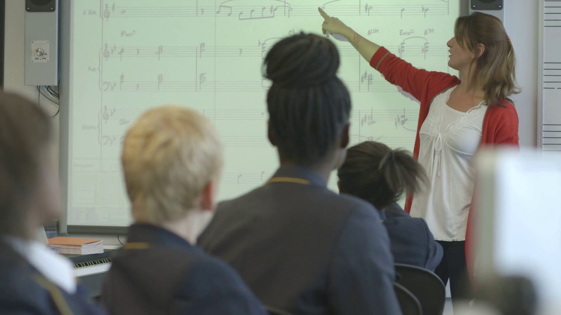 Ms Music Teacher Teaching Children With Stock Footage SBV338842679
