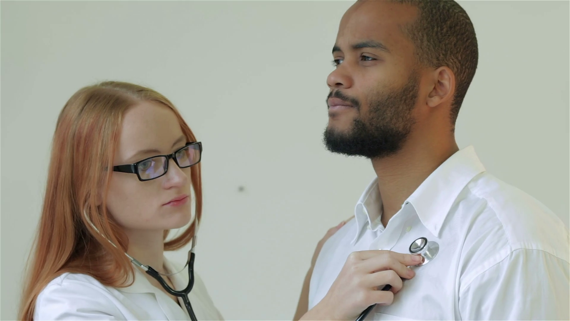 Take a deep breath, the doctor heard wheezing in the chest Stock Video