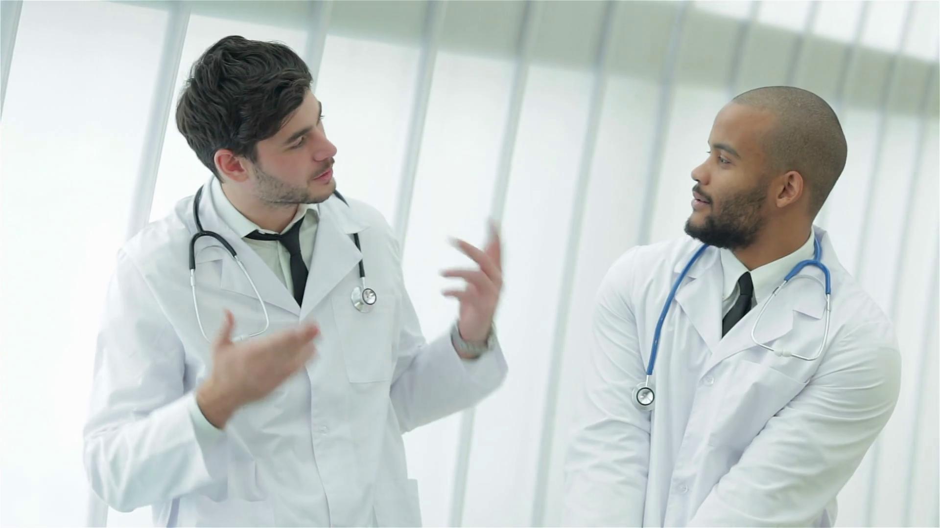 Two Young Doctors In Medical Gown Lively Stock Footage SBV309727353