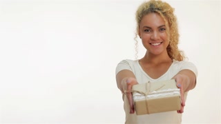 woman holding a present in hands