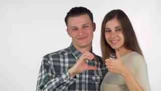 Platonic connection: A heart sign and thumbs up between friends