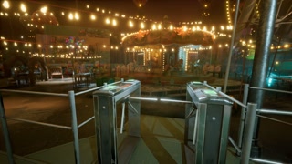 An empty amusement park at night with colorful lights and a carousel