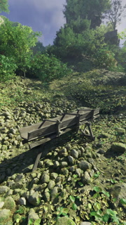 Natural landscape with a wooden cart resting on rocky terrain in daylight