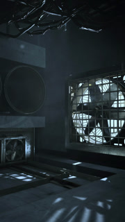 Dark industrial room with large fans spinning quietly in the shadows