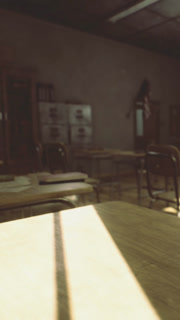 Empty classroom with desks and sunlight streaming through the window