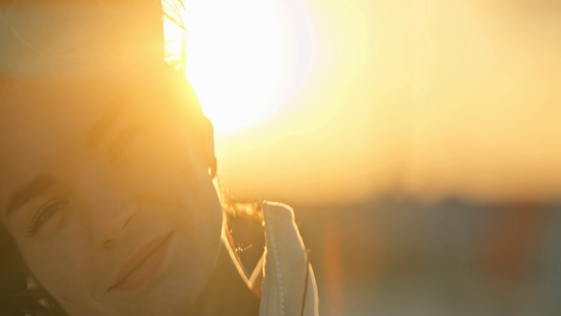 Young Woman Enjoying Golden Hour Sunlight Stock Footage SBV-352163263 ...
