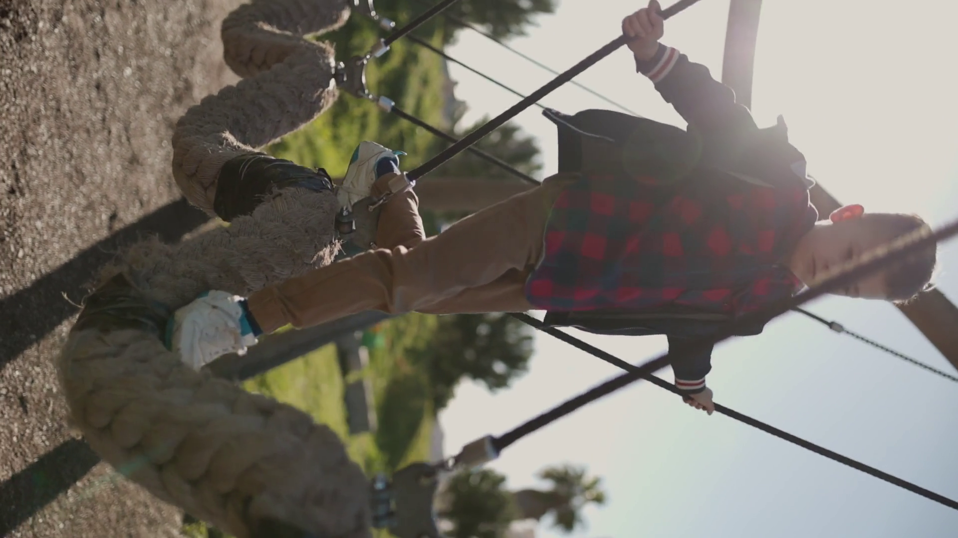 Young Boy Balancing On Rope Swing At Stock Footage SBV-352660812 ...