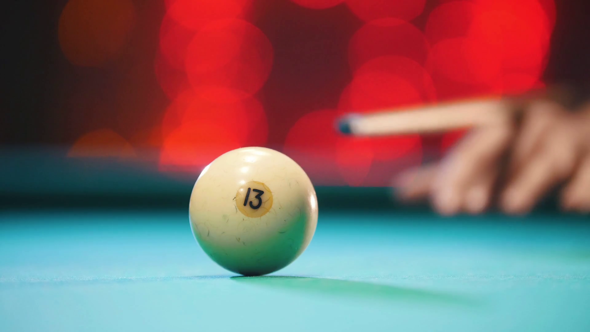 Billiards club. A person playing billiards. A cue hitting the ball with 13 number Stock Video