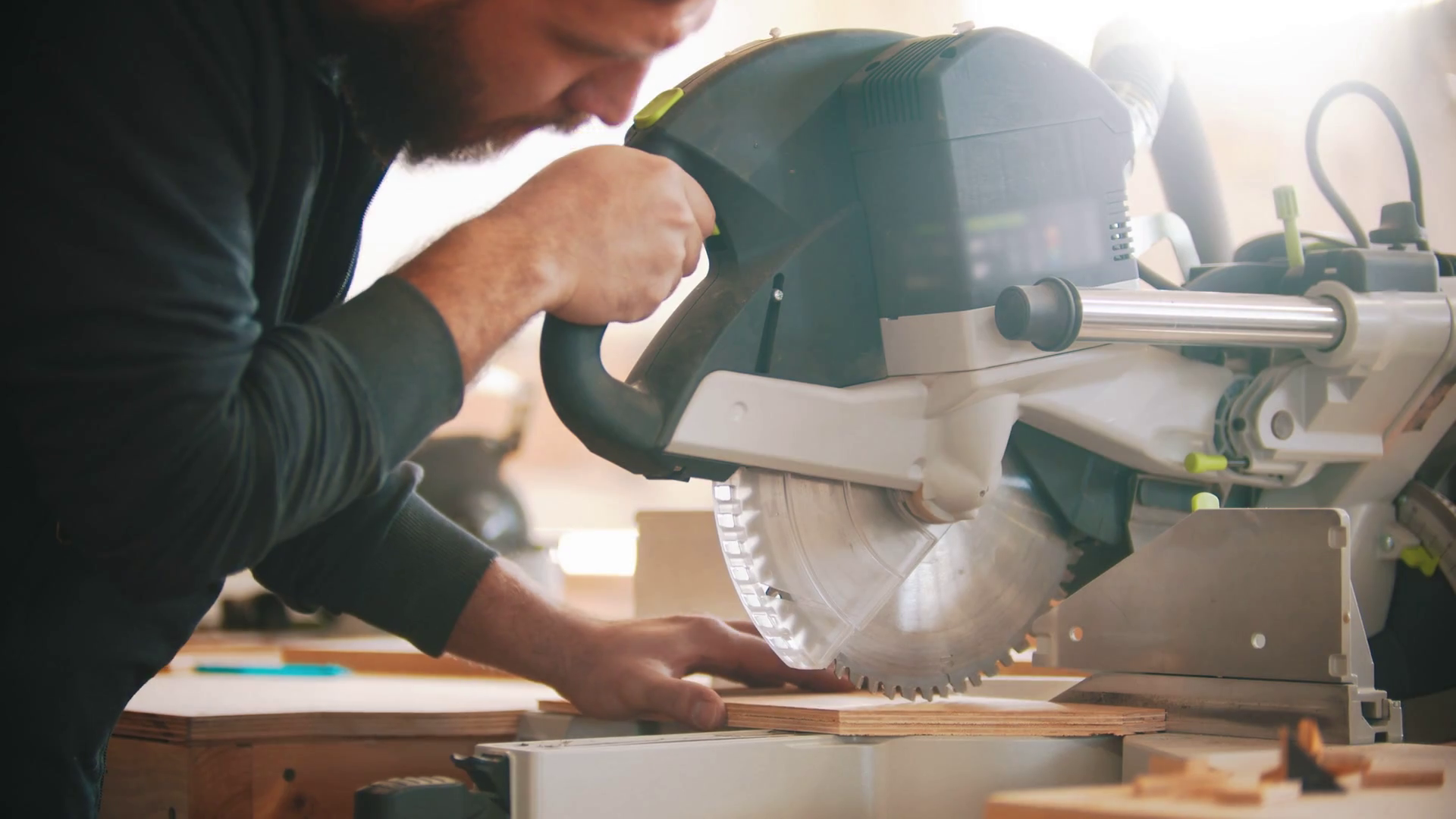 Carpentry working cutting the plywood using circular saw Stock Video