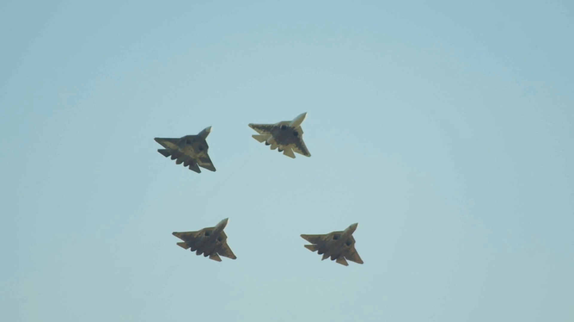 Four green military fighter jets flying in the sky Stock Video Footage