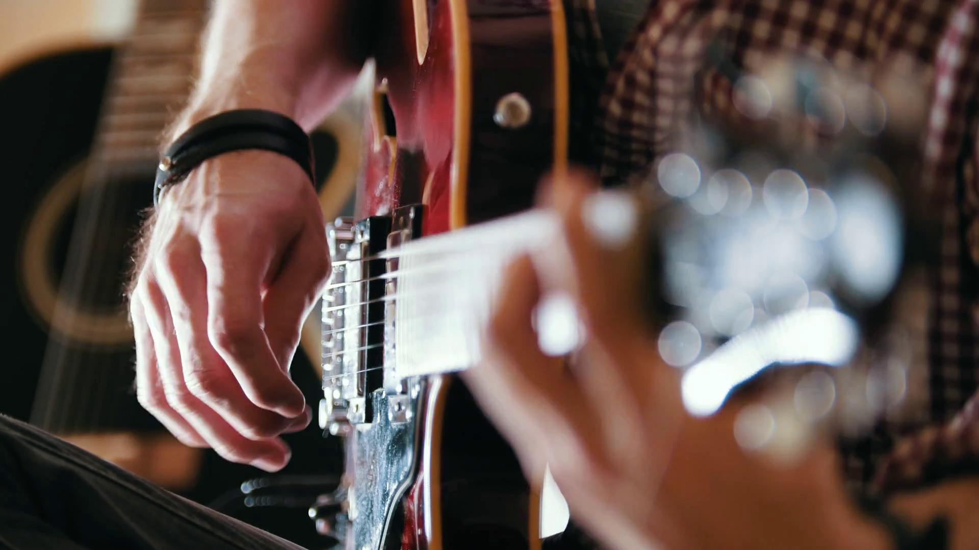 Male musician plays the guitar, hands close up Stock Video Footage 00
