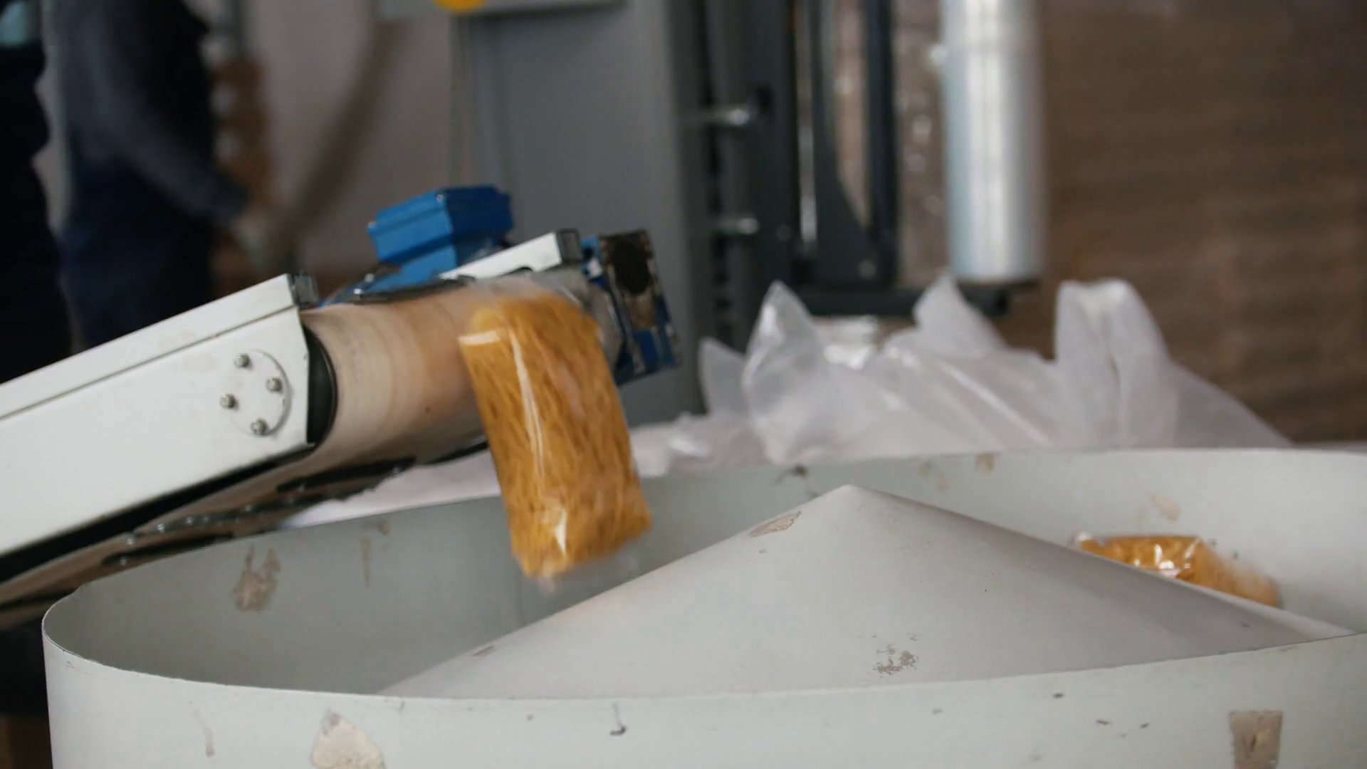Packaging raw macaroni in a pasta factory Stock Video Footage 0010 SBV
