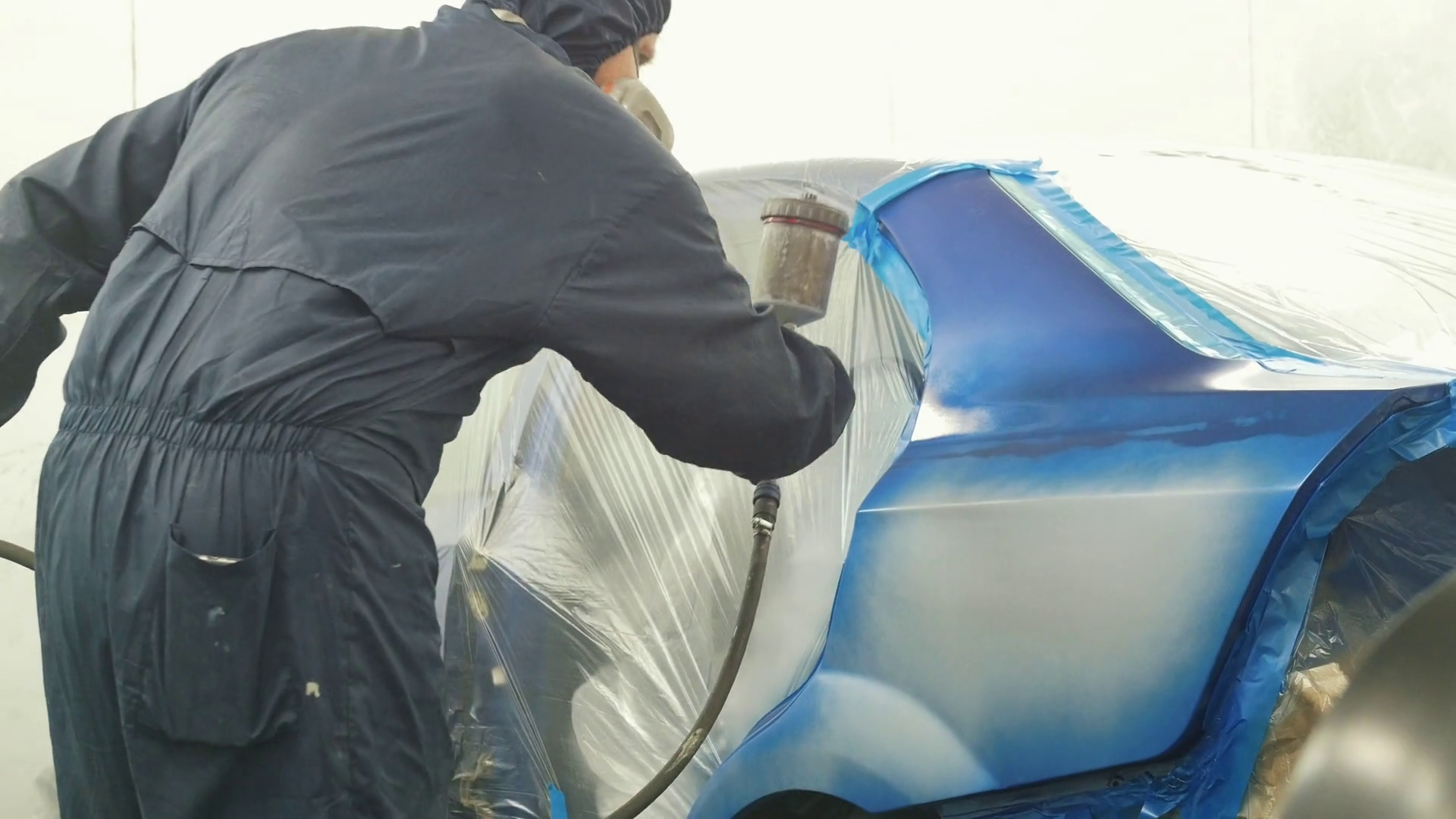 Professional car painter in vehicle Stock Video Footage 0014